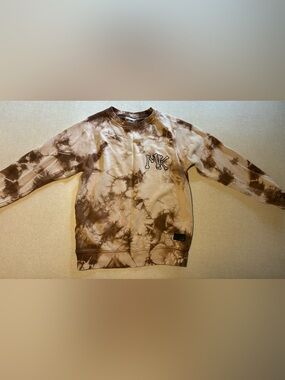 Munstr Vintage-Style Brown tie dye Graphic sweatshirt with thumb holes.